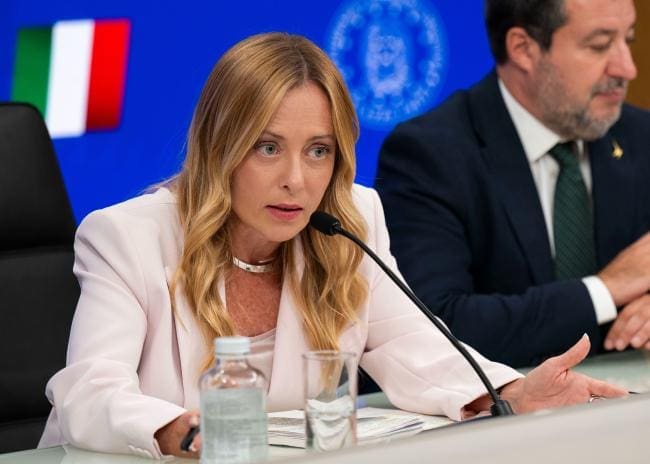 Meloni targets burqas and migrant pupils under pressure from far-right opponent